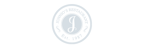 Logo for Junno's Restaurant, established in 1987, crafted by a leading Toronto Design Agency. It features a large letter "J" in the center within a circular design, showcasing Conte Studios' commitment to elegant brand aesthetics. Conte Studios