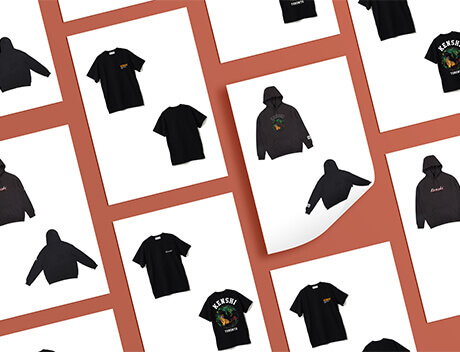 Collection of black T-shirts and hoodies with various graphic designs, expertly curated by a Toronto Design Agency, displayed on a brown background. Conte Studios