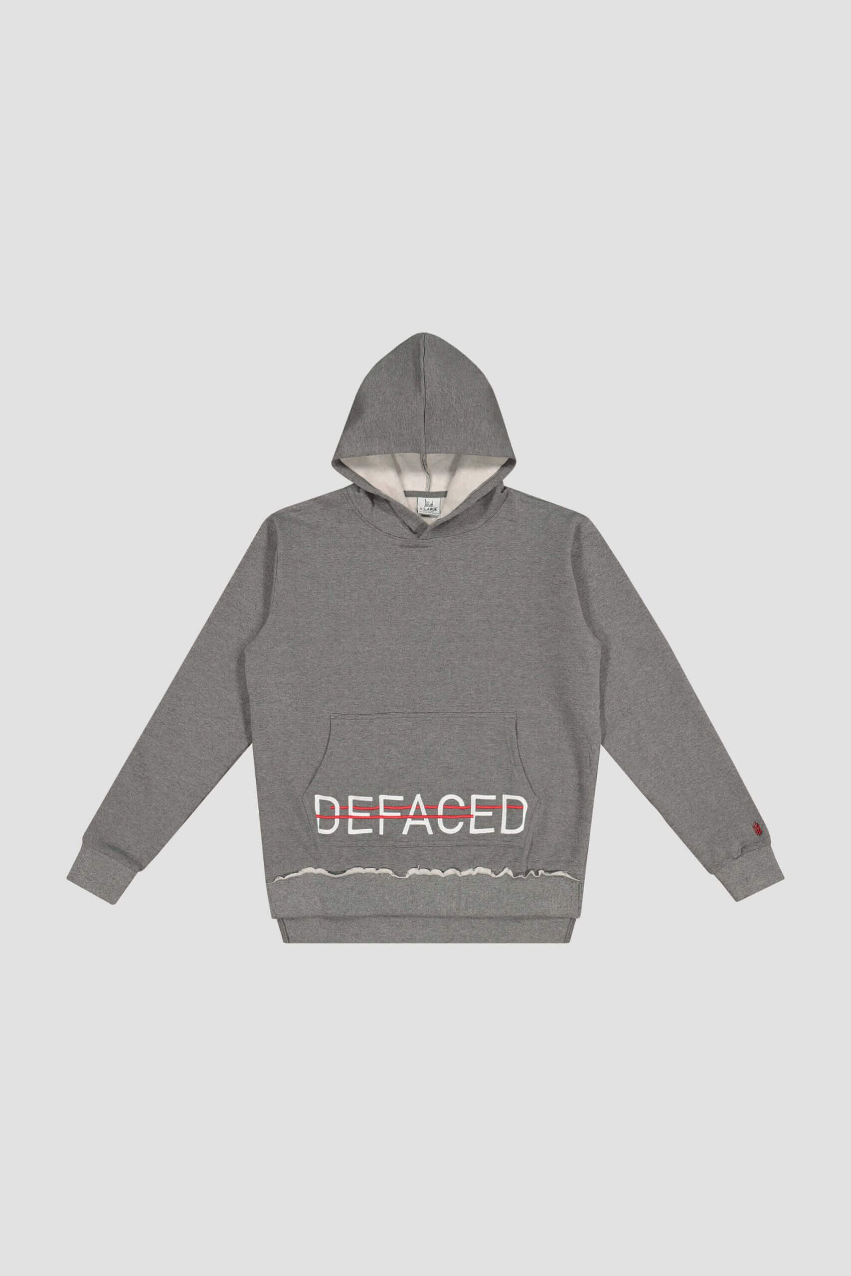 Grey hoodie with "DEFACED" printed in white and pink on the front. The hem features a subtle wave design, reminiscent of cutting-edge content creation from Toronto's top agencies. Conte Studios