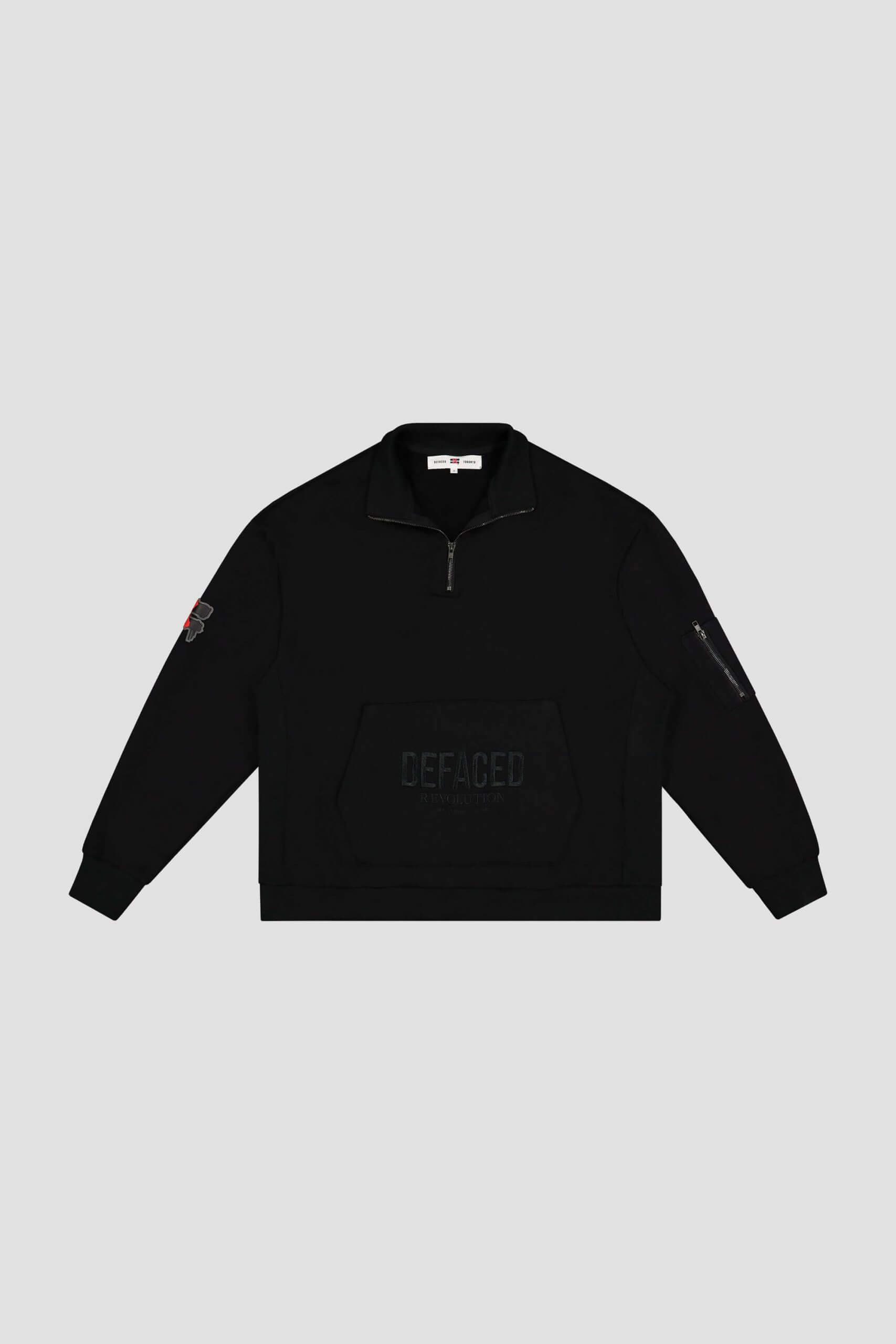 Black pullover sweatshirt with zipper collar and front pocket, featuring subtle "DEFACED" text and a small embroidered patch on the left sleeve, crafted with the sleek creativity you'd expect from a Toronto design agency. Conte Studios