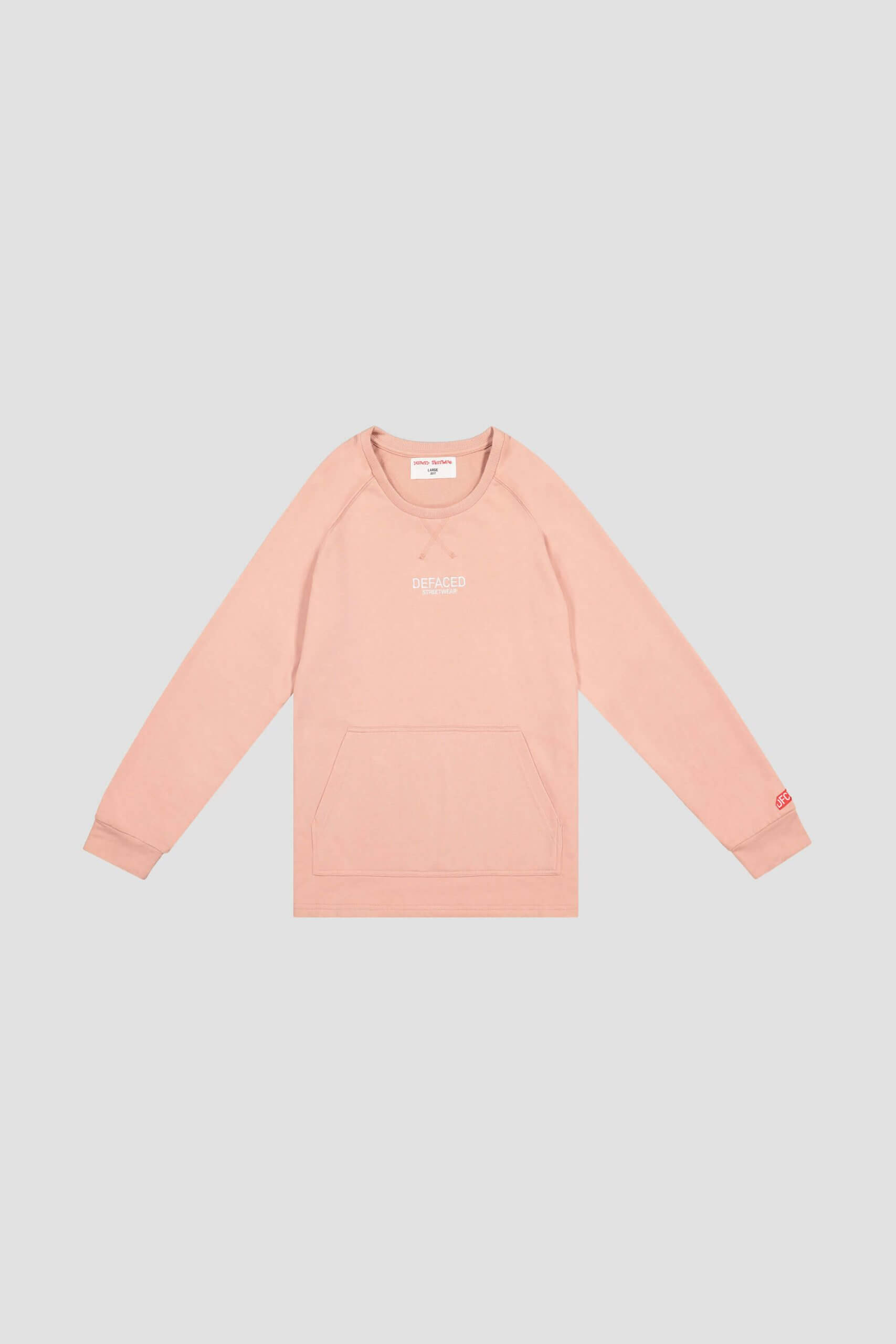 Pink long-sleeve sweatshirt with "Breakfast Club" text on the chest and a front pocket, showcased on a light gray background. Designed in collaboration with a leading Toronto design agency, this piece blends style and comfort effortlessly. Conte Studios