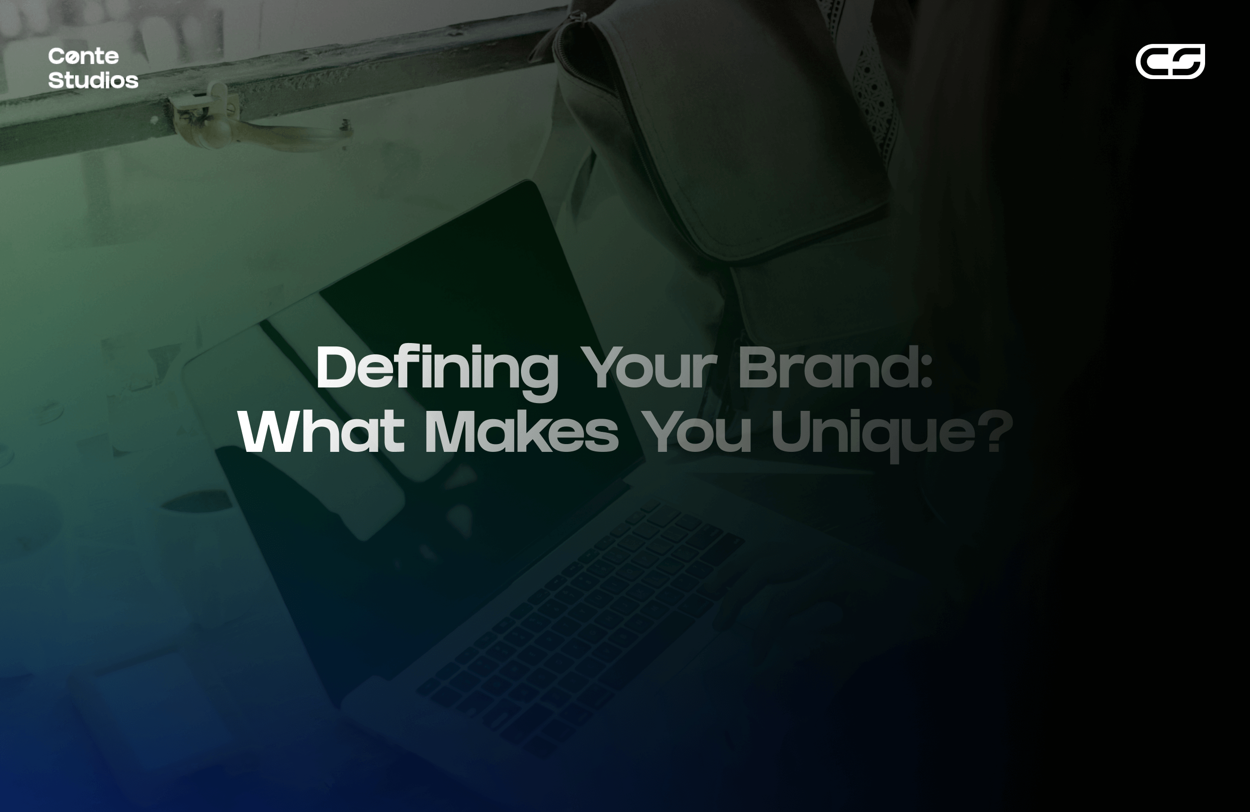 A laptop with the text "Defining Your Brand: What Makes You Unique?" displayed on the screen, with a gradient background. Conte Studios