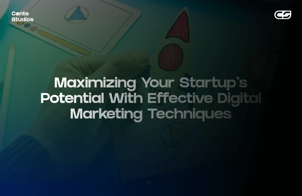 Hand holding a paper rocket, surrounded by drawing tools. Text overlay reads: "Maximizing Your Startup’s Potential With Effective Digital Marketing Techniques. Conte Studios